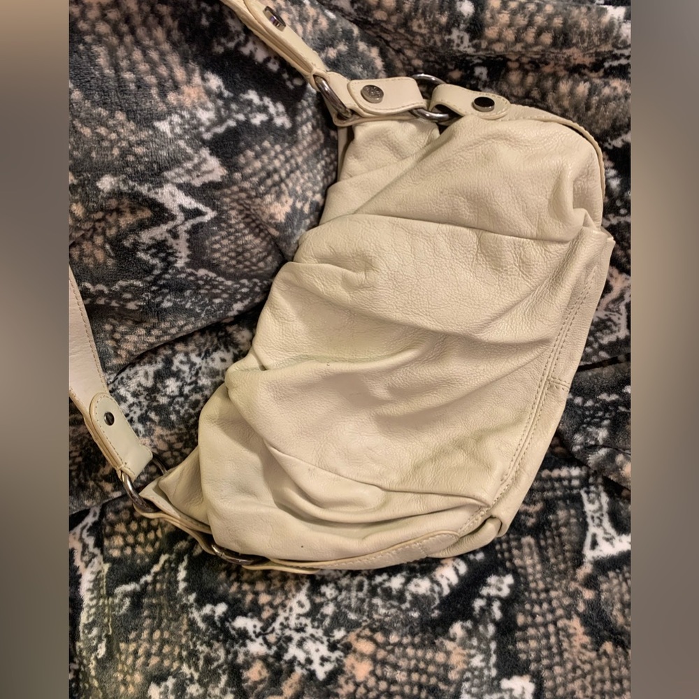 Cream colored handbag never used leather
